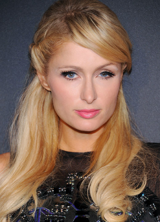 Television personality Paris Hilton arrives at a...